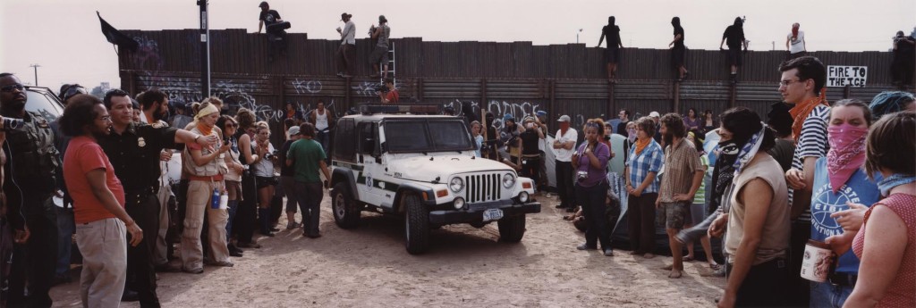 Photo:  Kai Wiedenhöfer. U.S. Border Patrol officers negoating with activists who had put up a protestcamp on both side of the Mexican-US border. The officers wanted to make sure nobody entered the US from the Mexican side during the protest. Calexico, California, USA. November 2007.